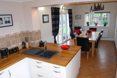 Bespoke kitchen with island and timber worktop