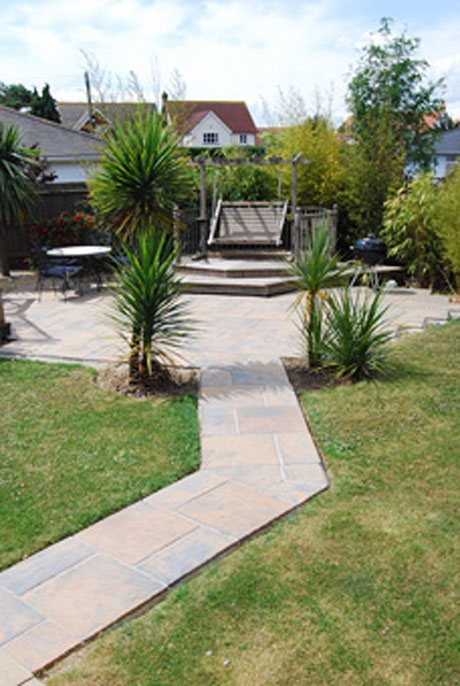 Heybridge patio with raised pergola