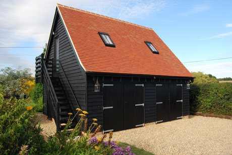 Black oak-frame barn-style garage, Essex