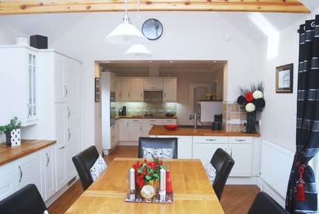 Bespoke kitchen with timber beam